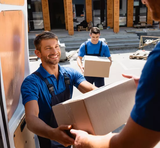 Mover handing a box to another mover
